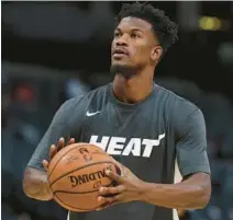  ?? DAVID ZALUBOWSKI/AP ?? Heat forward Jimmy Butler got back to work and back to talking Saturday.