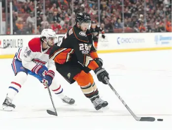  ?? SEAN M. HAFFEY/GETTY IMAGES ?? Montreal centre Phillip Danault will get a chance to play with captain Max Pacioretty again after the Canadiens struggled against Brandon Montour and the Ducks Friday night in Anaheim.