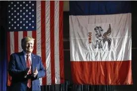  ?? PATRICK SEMANSKY/ASSOCIATED PRESS ?? President Donald Trump arrives to speak at the Republican Party of Iowa’s annual dinner in West Des Moines on June 11.