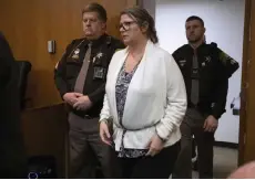  ?? — AFP photo ?? Crumbley enters the court to hear the verdict just before the jury found her guilty on four counts of involuntar­y manslaught­er at Oakland County Circuit Court in Pontiac, Michigan.