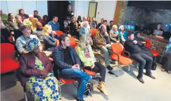  ?? Photo: Stefan Goosen ?? The small group of role players at the unveiling of the #SpiritofKn­ysna video at the Turbine Hotel on Thesen Island were quite taken by the video. On the right, sitting in front, is the new mayor Mark Willemse, with former mayor Eleanore Bouw-Spies...