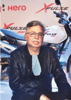  ??  ?? Pawan Munjal, CMD and CEO of Hero MotoCorp, says the company is still working on its strategy for the premium segment