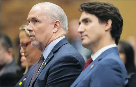 ?? THE CANADIAN PRESS/FILES ?? Premier John Horgan could derail Canada’s strides to reduce greenhouse emissions, says Prime Minister Justin Trudeau.