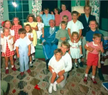  ?? SUBMITTED PHOTO ?? The Kennedy clan gather with the leaders of the family, Joe Kennedy Sr. and his wife, Rose, in a photo from the new book by Ridley native and celebrity biographer J. Randy Taraborrel­li.