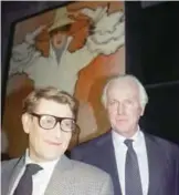  ??  ?? In this file photo taken on October 21, 1991 French designers Yves Saint-Laurent and Hubert de Givenchy (right) pose together in the Galliera Museum during a reception honoring Givenchy for his 40 years in fashion.