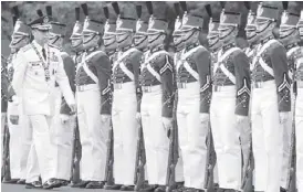  ?? KJ ROSALES ?? Incoming Armed Forces chief Gen. Noel Clement is shown during the change of command ceremony at Camp Aguinaldo in Quezon City yesterday.