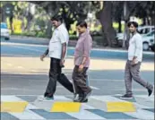  ?? RAVI CHOUDHARY/ HT PHOTO ?? People cross the road using a 3D zebra crossing outside Vigyan Bhavan on Friday.