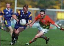  ??  ?? Kevin O’Brien leaves a Carlow defender for dead.