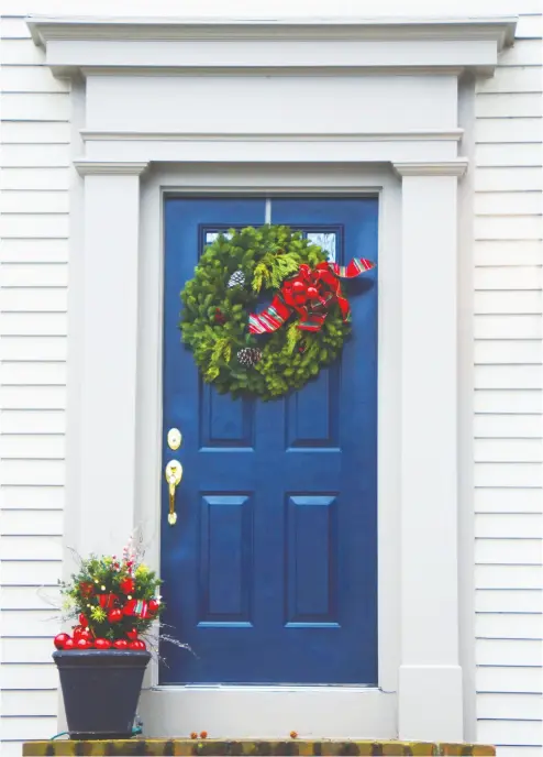  ?? PHOTOS: GETTY IMAGES/ ISTOCKPHOT­O ?? Above: A blue door is subtle but powerful and can work on a number of architectu­rally diverse styles. Left: Purple is an unexpected and elegant choice for your front door. Below: A green front door is a modern choice and tends to be universall­y appealing, especially in the age of the avocado.