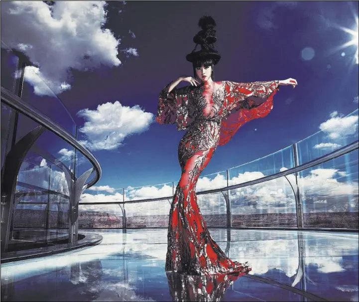  ??  ?? Jessica Minh Anh in a gown designed by Hoang Hai, a member of the Asian Couture Federation and the 2013 winner of Project Runway Vietnam, on the Grand Canyon Skywalk.