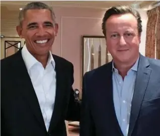  ??  ?? Old pals: Mr Cameron later posted a photo with Mr Obama on Twitter