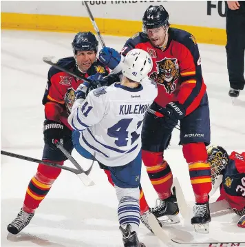  ?? — GETTY IMAGES FILES ?? Erik Gudbranson, right, in action with the Panthers in 2014, learned positionin­g and aggression from teammate Ed Jovanovski, left.