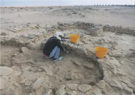  ?? Abu Dhabi TCA ?? Abdulla Al Kaabi, coastal heritage archaeolog­ist at TCA Abu Dhabi, excavates Room 2 at MR11 on Marawah Island