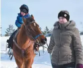  ?? - Acadie Nouvelle: Vincent Pichard ?? Malgré le vent et le froid polaire de dimanche, les petits ont aimé faire un tour à cheval à la mini-ferme Le Paradis, rue Lavigne à Caraquet.