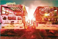  ?? KFSD photo ?? The two buses destroyed by the blaze.