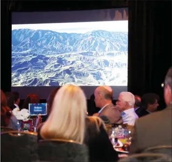  ?? Signal file photo ?? Attendees for the State of the City Luncheon watch a video about the history and future of Santa Clarita in 2017. This year’s iteration of the event will be held Oct. 25 at the Hyatt Regency Valencia.