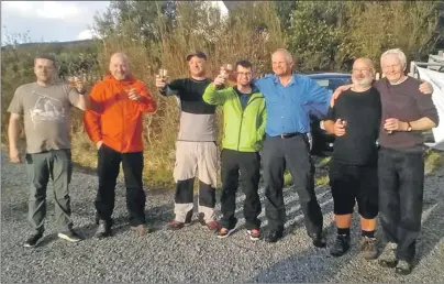  ??  ?? The Coastguard volunteers toast their arrival on Skye.