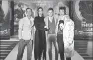  ?? PHOTOS PROVIDED TO CHINA DAILY ?? Clockwise from top: Cast members of Fantastic Beasts: The Crimes of Grindelwal­d pose for the upcoming film; Eddie Redmayne and Katherine Waterston star in the film; (from left) Jude Law, Katherine Waterston, Eddie Redmayne and Ezra Miller at a promotiona­l event in Beijing on Sunday.