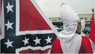  ?? SPENCER PLATT/GETTY IMAGES FILE ?? Backed by the American Civil Liberties Union, the Ku Klux Klan wants to adopt a highway in Georgia.