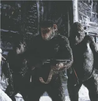  ?? TWENTIETH CENTURY FOX ?? From left, Terry Notary, Andy Serkis and Michael Adamthwait­e in “War for the Planet of the Apes.”