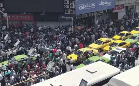  ?? EPA ?? Demonstrat­ors chant slogans in Tehran. Media reported that as a result of weak economic conditions in Iran, Tehran’s grand bazaar was closed and people took to the streets in protest