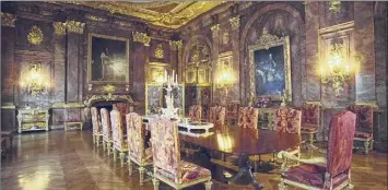  ?? Dea / M. Borchi / De Agostini via Getty Images ?? The dining room with walls of pink marble at the circa-1892 Marble House in Newport, R.I.