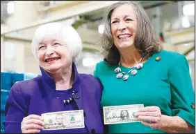  ?? LM OTERO / AP ?? Secretary of the Treasury Janet Yellen, left, and Treasurer of the United States Chief Lynn Malerba show off currency they autographe­d Thursday during a tour of the Bureau of Engraving and Printing’s Western Currency Facility in Fort Worth, Texas. Yellen unveiled the first U.S. currency bearing their signatures, marking the first time that U.S. bank notes will bear the name of a female treasury secretary and a female treasurer.