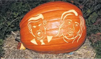  ??  ?? Each pumpkin is carefully carved to delight visitors. Last year, Donald Trump and Hillary Clinton’s images were etched in this gourd.