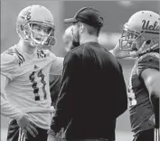  ?? Luis Sinco Los Angeles Times ?? JERRY NEUHEISEL, left, a Bruins quarterbac­k in 2015, is a Texas A&M graduate assistant now.