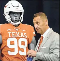  ?? USA Today Sports - Jerome Miron ?? Despite finishing the 2021 season with a 5-7 record, Steve Sarkisian’s Texas team received a first-place vote from an undisclose­d voter in the initial USA Today coaches poll.