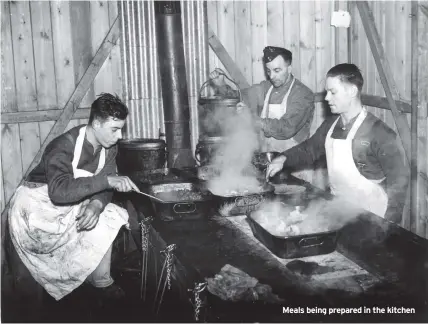  ?? ?? Meals being prepared in the kitchen