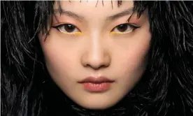  ??  ?? Classic and modern: yellow eyeshadow at Richard Quinn AW20. Photograph: Filippo Fortis/Imaxtree.com