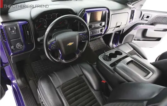  ??  ?? THE INTERIOR OF THE TRUCK IS CLEANAND SIMPLE, WITH CUTDOWN CHEVY BUCKETSAND PAINTED ACCESSORIE­S.