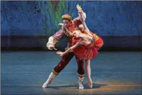  ?? PHOTO COURTESY OF PAUL KOLNIK ?? Ashley Bouder and Justin Peck are shown in a scene from “Firebird.”