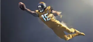  ?? NIKE PHOTOS ?? Top, quarterbac­k Russell Wilson models the Seahawks’ bright Color Rush uniform. Above, wide receiver Allen Robinson showcases the Jaguars’ gold threads.