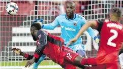  ?? FRANK GUNN / THE CANADIAN PRESS ?? Toronto FC forward Jozy Altidore makes a diving header during MLS action in Toronto.