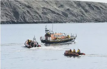  ??  ?? All three lifeboats - the all-weather boat, Atlantic 85 and D class inshore boat - on exercise on Sunday.