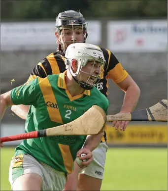  ??  ?? Ciaran Murphy of Buffers Alley is tracked by Conor Byrne of Shelmalier­s during their Pettitt’s Senior hurling championsh­ip match in Innovate Wexford Park.