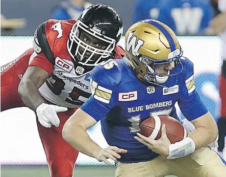  ?? KEVIN KING ?? Stampeders defensive end Ja’Gared Davis made his debut against the Winnipeg Blue Bombers last weekend and notched a pair of sacks.