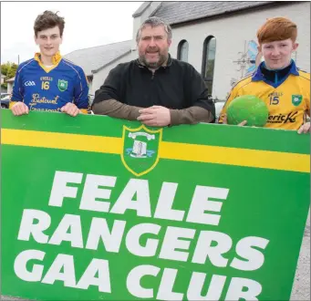  ??  ?? Feale Rangers chairman Christy Walsh, centre, with Feale Rangers minor footballer­s at the time, Donal Hunt and Darragh Lynch, at the launch the Feale Rangers fundraisin­g Night at the Dogs a few years ago.