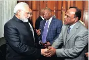  ??  ?? Durban businessma­n Vivian Reddy, with Narendra Modi, at the SA-India Business and Chief Executives Forum in Johanesbur­g, where President Jacob Zuma announced plans to accelerate trade between South Africa and India by 2018.