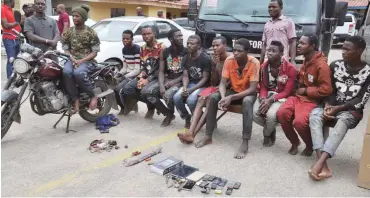  ?? Photo: Benedict Uwalaka ?? Suspected robbers allegedly caught operating at Royal Garden Estate in Lagos, during their parade at the Lagos State Police Command in Ikeja on Monday