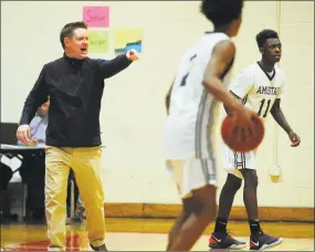  ?? Christian Abraham / Hearst Connecticu­t Media ?? Amistad coach Ryan Ott during the Robert Saulsbury Basketball Invitation­al against Kolbe Cathedral in December.