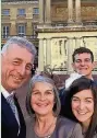  ??  ?? Porthcawl RNLI volunteer Aileen Jones with husband Steve, daughter Frances and son Dan at Buckingham Palace