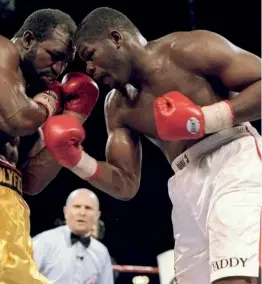  ??  ?? THE SEQUEL: The loss to Holyfield in their return still leaves a bad taste in Bowe’s mouth