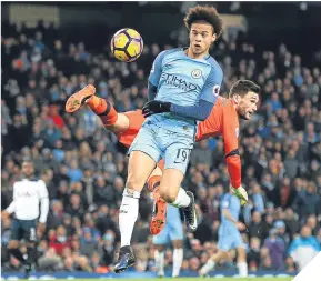  ??  ?? Leroy Sane opens the scoring for Manchester City.
