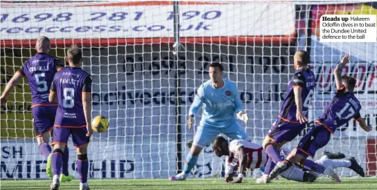  ??  ?? Heads up Hakeem Odoffin dives in to beat the Dundee United defence to the ball