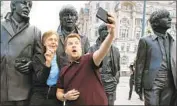  ?? Craig Sugden CBS ?? FORMER BEATLE Paul McCartney, left, takes fellow Brit James Corden on a tour of Liverpool in “Carpool Karaoke: When Corden Met McCartney.”