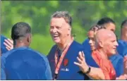  ?? AFP ?? Netherland’s coach Louis van Gaal (C) during a training session at Qatar University in Doha on Wednesday.