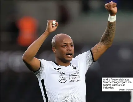  ?? GARETH EVERETT ?? Wayne Routledge
Andre Ayew celebrates Swansea’s aggregate win sgainst Barnsley on Saturday.